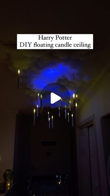 lexi yurgin on Instagram: "Harry Potter DIY floating candle ceiling!!!

I was so excited to make this for my Halloween party this year. Thank u Ryan and friends for helping my HP dreams come true. 

WHAT YOU’LL NEED:
-poster board (I used 2 thicker pieces of poster board that were 2x3 ft)
-spray adhesive (we used exactly 1 can)
-poly fill (we used exactly 1 bag)
-blue LED light strips (I got 1 strip on Amazon, but make sure they have a lightning effect)
-floating candles with fishing wire attached (also found on Amazon and they turn on with a wand which I also used for my Bellatrix costume lol)
-heavy duty command strips (we used about 20)

STEPS:
1. Tape the poster boards together with packing tape 
2. Tape the blue LED lights to the poster board in a random loopy design to mimic a lightn Floating Candles Harry Potter Ceilings, Floating Keys Harry Potter, Harry Potter Night Sky Ceiling, Diy Harry Potter Lamp, Diy Harry Potter Ceiling, Harry Potter Ceiling Clouds, Harry Potter Cloud Ceiling, Harry Potter Candles Floating, Floating Candles Ceiling