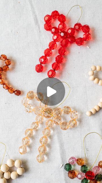 Geneva Vanderzeil | Making beaded bow ornaments! So many of you have asked for a slowed down tutorial for these so here it is. They are actually so easy to... | Instagram Beaded Bow Ornament Diy, Handmade Beaded Ornaments, Bead Bow Ornament, Clear Ornament Diy Ideas, Acrylic Bauble Ideas, Beaded Bow Ornament, Diy Bead Christmas Ornaments, Christmas Bead Garland Ideas, Beaded Xmas Ornaments