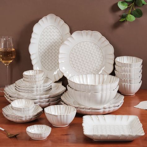 Dinner delight with our tabletop treasures! 🍽️😍 Step up your hosting game with our stunning dinner sets that are perfect for any occasion. Because great meals deserve great presentation too. 🤩 Products featured: 1. Lao Luxury 22 Piece Dinner Set For 6 Mint Green 2. 22 Piece Scallop Cream Luxury Dinner Set For 6 3. White Stoneware Design 28-Piece Dinner Set For 6 4. Earthy 22 Piece Dinner Set For 6 Sage Green 5. Lilac Scalloped 22 Piece Dinner Set For 6 6. Blue 26 Piece Dinnerware Set For 6 ... Luxury Dinner Set, Dinner Set Design, Kitchen Decor Collections, Ceramic Dinner Set, Succulent Centerpieces, Moroccan Art, Ceramic Dinnerware Set, White Dining Table, Luxury Dinnerware