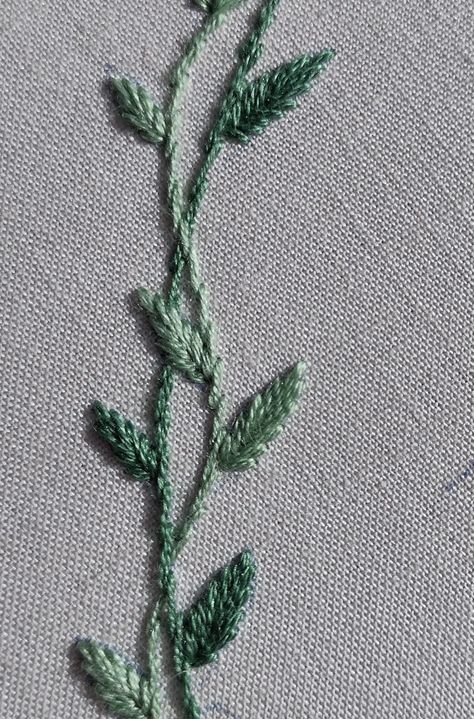 Hand embroidered interlacing vines with leaves Embroidered Leaf Pattern, Oak Leaf Embroidery Pattern, Vines Embroidery Pattern, Simple Vine Embroidery, Flower And Leaves Embroidery, Embroidered Ivy Leaves, Embroidered Vines And Leaves, Hand Embroidery Vines, Embroidered Vines And Flowers