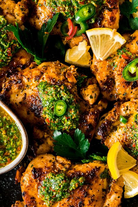 Chicken Thighs with Chimichurri Sauce served on a black plate Chimichuri Sauce, Chimichurri Chicken, Pork Medallions, Beef Strips, Chilli Peppers, Chimichurri Sauce, Perfect Dinner, Dinner Inspiration, Roasted Meat