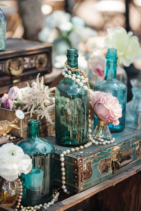 Dive into matrimonial bliss with our unique collection of nautical-themed wedding centerpieces. Think treasure chests filled with shimmering accents and bottles that whisk you away to the ocean's edge 🌊💍 Create a magical and adventurous tablescape that will enchant your guests. #WeddingInspiration #NauticalWedding #WeddingCenterpieces #TreasureDecor #BeachWeddingIdeas #RomanticWedding #UniqueWedding #TableDecor Pirate Theme Wedding Ideas, Pirate Themed Wedding Decor, One Piece Themed Wedding, Aquatic Wedding Theme, Pirates Of The Caribbean Wedding Theme, Ocean Themed Wedding Decorations, Treasure Chest Centerpiece, Pirates Of The Caribbean Wedding, Aquatic Wedding