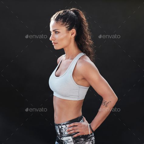 Slim and fit young woman in sportswear by jacoblund. Side view of a slim and fit young woman in sportswear standing with her hands on hips and looking away. Muscular fema...#sportswear, #jacoblund, #Side, #woman Waist Training Results, Workout Girl, Woman Fitness, Bra Photos, Perfect Abs, Slim And Fit, Hands On Hips, Orange Swimsuit, Athletic Girls