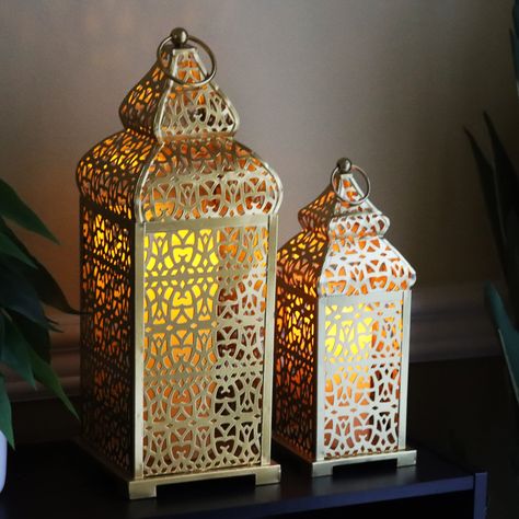 PRICES MAY VARY. STYLE: Moroccan candle lanterns are exquisite, decorative lighting accents that have been popular in Moroccan and Middle Eastern decor for centuries. They are known for their intricate designs and their ability to cast enchanting patterns of light and shadow when illuminated. Moroccan decorative lanterns create captivating light patterns through the openings in their metalwork. The intricate patterns allow light to filter through, casting beautiful and mesmerizing patterns on wa Indian Lanterns, Middle Eastern Decor, Moroccan Candles, Lantern Hooks, Decorative Lanterns, Moroccan Lantern, Indoor Home Decor, Moroccan Theme, Style Marocain