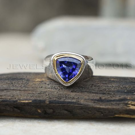 natural tanzanite ring boho gemstone ring bold 925 sterling silver ring handmade ring women engagement tanzanite ring wholesale Indian product bezel setting gemstone ring  Gemstone: Tanzanite Stone Shape: Triangle  Stone Color: Blue Metal: 925 Solid Silver Ring Size : All Sizes Rings Available Tanzanite :- Meaning Of Gemstone :- Beautiful lab made Tanzanite one of December birthstones alongside bridesmaids jewelry for a December wedding jewelry Benefits Of Gemstone :- Tanzanite is commonly believed to facilitate a higher consciousness and stimulate intuition and perception. Some believe that it aids in detoxifying the body and improving vitality. It is said to be a good stone to wear or have near in situations where you need a calming and soothing presence. NOTE :- Product Color May Slight Silver Band Ring Wedding, Stone Rings For Men, Silver Ring Designs, Bezel Set Ring, Tanzanite Stone, Tanzanite Ring, Tanzanite Gemstone, Natural Tanzanite, Making Tools