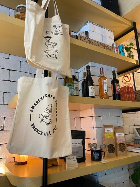 Display Merchandise Ideas, Cafe Merchandise Display, Coffee Shop Merchandise, Coffee Shop Merch, Cafe Tote Bag, Cafe Merch, Cafe Merchandise, Coffee Merch, Coffee Display