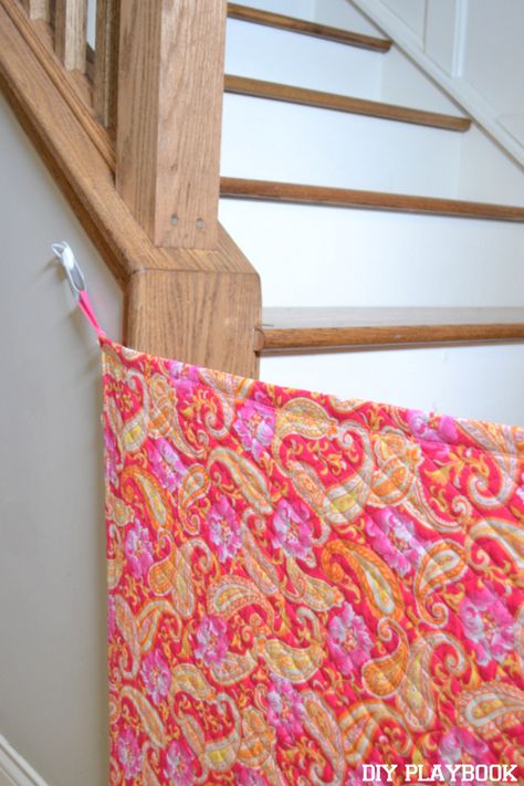 If you have uneven stairs, create this colorful fabric gate to keep your kids or pets from going up them! Diy Baby Gate For Stairs, Fabric Baby Gates, Gate For Stairs, Baby Gate For Stairs, Diy Baby Gate, Stair Gate, Diy Shows, Diy Playbook, Diy Bebe