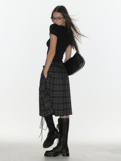 This product, a check frill pleats midi skirt, brings classic patterning into a modern context. The skirt's design features crisp pleats for structured elegance and frilled edges for a soft, feminine touch. It balances sophistication with a playful edge, ideal for diverse occasions. - A timeless check pattern graces this midi skirt, offering a versatile piece that pairs well with both simple and bold tops.- It's crafted with a comfortable waistband, ensuring the skirt sits at a flattering point and provides ease of wear throughout the day.- Detailed with a frill hem, the skirt adds a delicate finish to the structured pleats.- The midi length is perfect for transitional weather, lending itself to both sandals and boots for different looks. Check Midi Skirt Outfit, Midi Skirt And Boots Outfit, Long Skirts Outfit, Skirt And Boots Outfit, Pleated Midi Skirt Outfit, Midi Skirt And Boots, Pencil Skirt Outfit, Layered Outfits, Midi Skirt Outfit