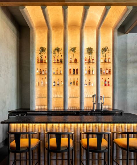 A Houston classic, re-imagined with modern iterations of traditional Sichuan elements. #gindesigngroup #hospitalitydesign #houstondesign #luxuryinteriordesign #ginbraverman #restaurantdesign #interiordesign #awardwinninginteriordesign Unique Bar Counter Design, Gin Bar Design, Restaurant Lounge Interior Design, Bottle Shop Design, Restaurant Bathroom Ideas, Bar Back Design, Unique Bar Design, Sichuan Restaurant, Restaurant Counter Design