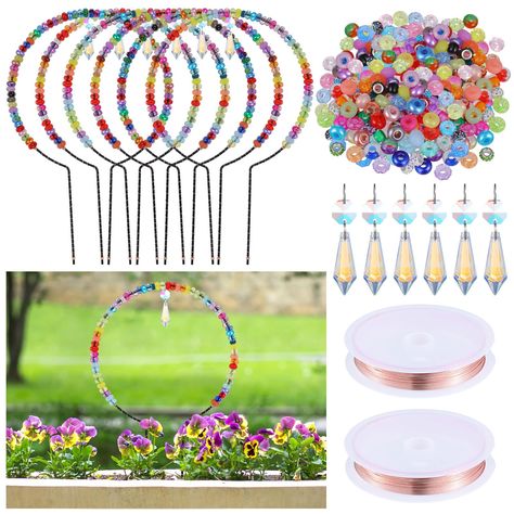 PRICES MAY VARY. Beaded Garden Stakes Package: you will get 6 pieces of arched fairy stakes, 6 pieces of chandelier crystal ornaments, 2 rolls DIY metal wire, 360 pieces of round painted rhinestone beads in bright colors, 374 pieces in total; Well suited for garden stakes for decorative beaded garden stakes and other outdoor decorations Reliable Material: round hoop garden stakes are made of sturdy stainless steel, centered chandelier are made of quality crystal; They are strong, resistant to he Garden Stakes Diy, Diy Fairy Wand, Hoop Garden, Beaded Garden Stakes, Chicken Wire Projects, Light Catchers, Decorative Garden Stakes, Garden Whimsy, Chandelier Crystal