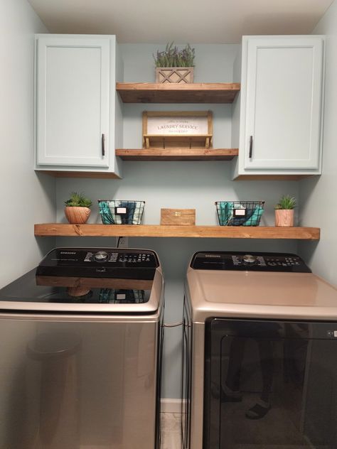 Painted cabinets, stained shelves, laundry room makeover Above The Washer And Dryer Storage, Above Washer Cabinets, Above Dryer Storage, Shelving Around Washer And Dryer, Above Washer Dryer Storage, Laundry Room Ideas Above Washer And Dryer, Above Washer And Dryer Cabinets, Above The Washer And Dryer Ideas, Washer Dryer Shelves