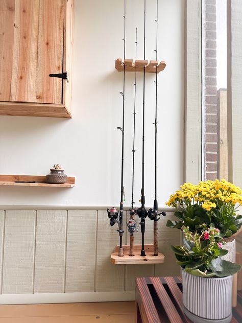 Step by step on how to make a DIY Wood Fishing Rod Holder Fishing Pole Display, Fishing Pole Holder Diy, Diy Fishing Pole, Diy Fishing Rod Holder, Fishing Gear Organization, Fishing Pole Rack, Diy Fishing Rod, Fishing Pole Storage, Fishing Pole Holder