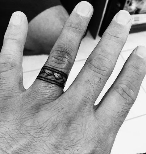 Male Wedding Band Tattoo Ideas, Tea Leaf Tattoo, Tattoo Wedding Rings For Men, Tea Leaves Tattoo, Wedding Band Tattoo Ideas, Tattoo Ring Finger, Marriage Ring Tattoos, Band Tattoo Ideas, Wedding Band Tattoo