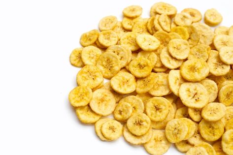 Banana slice chips on white background | Premium Photo #Freepik #photo #banana-chips #fried-banana #banana-slice #banana Banana Picture, Banane Plantain, Banana Chips, New Background Images, Banana Slice, Event Food, Premium Photo, White Background, Chips