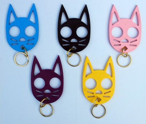 Slip your fingers through the holes and the kitty cat becomes a close-proximity defense tool. 3d Tiskárna, Defense Keychain, Self Defense Women, Self Defense Tips, Self Defense Keychain, Self Defense Tools, Cat Keychain, Two Fingers, Cat Ring