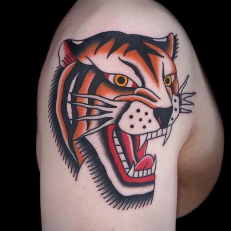 Tiger Tattoo by Jimmy Snaz Jimmy Snaz, Traditional Lion Tattoo, Traditional Sailor Tattoos, Traditional Tiger Tattoo, Female Lion Tattoo, Tiger Head Tattoo, Small Lion Tattoo, Tato Tradisional, Sailor Tattoos