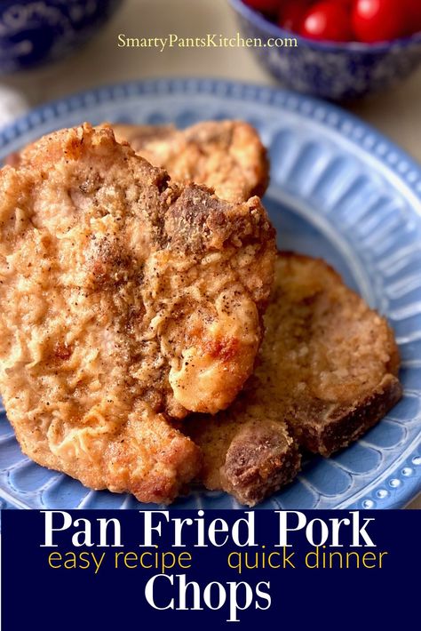 Pan fried pork chops on blue plate. Fried Pork Chops Without Flour, Bone In Pan Fried Pork Chops, Recipe For Fried Pork Chops, Pork Chop Coating Recipes, Boneless Fried Pork Chop Recipes, Simple Fried Pork Chops, Lightly Breaded Pork Chops, Tender Pan Fried Pork Chops, Fried Breakfast Pork Chops