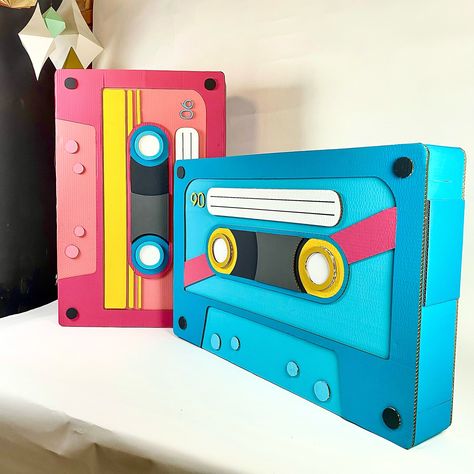 Gigantic Paper Music Cassette Music is life… 🎶 Made of cardboard and painted in vivid shades of pink and blue, this pair of music cassettes looks fantastic! Look our paper artist sit beside the cassettes! The paper cassette is real huge! 🎵🎨 Let paper art decorations take the event to the next level! Anything you can dream about is possible with DH Paper! DM us for more information or explore more at www.doraharun.com #DHPaperArt #DoraHarun #PaperArt #musiccassette #commercialartist #pape... Artist Zine, Paper Cassette, Music Cassette, Paper Artist, Shades Of Pink, Music Is, Art Decoration, Music Is Life, Paper Art