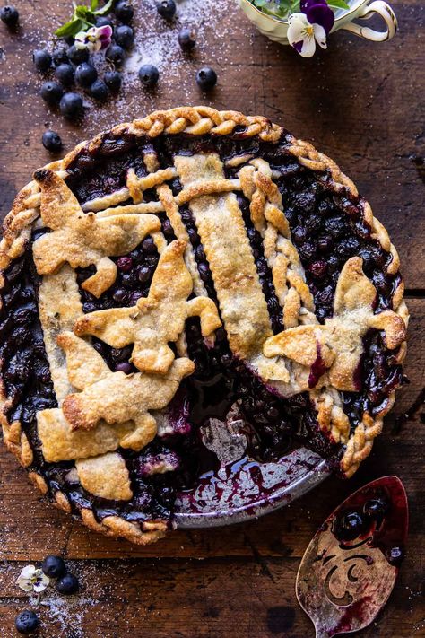 This Blueberry Lavender Pie is the quintessential summertime treat and so easy to create. It’s blueberry-filled, extra juicy, perfectly flavored with summery lavender, and oh so delicious! The pie crust base is a simple salted butter pie dough made special with a small touch of rye flour. The filling has lavender and lemon with plenty of fresh blueberries for the maximum berry experience. Lavender Pie, Peach Blueberry Pie, Mini Blueberry Pies, Blueberry Crumb Bars, Blueberry Lavender, Half Baked Harvest Recipes, Pie Crust Designs, Lemon Layer Cakes, Berry Pie