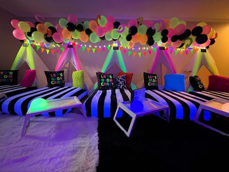 Glow in the dark sleepover party Slay Party Theme, Glow In The Dark Slumber Party Ideas, Glow Tent Party, Neon Slumber Party, Neon Sleepover Party Ideas, Glow In The Dark Tent Party, Glow Slumber Party, Glow In The Dark Movie Night Party, Glow In The Dark Slumber Party