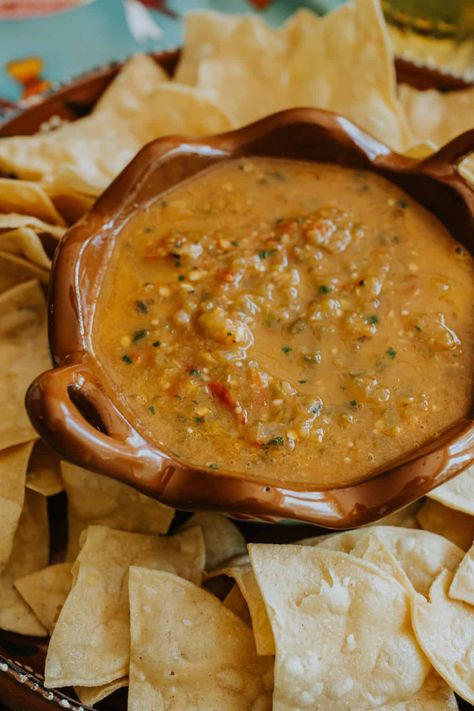 If you’ve been looking for a vibrant and spirited condiment to take your favorite Mexican meals to the next level of deliciousness, you need to try my simple recipe for Salsa Borracha! Also known as “drunken salsa,” this delightful taqueria-style dipping sauce features smoky chiles, roasted tomatoes, and an unmistakable hint of malty goodness. Taqueria Salsa, Recipe For Salsa, Salsa Borracha, Vegetarian Chile, Mexican Night, Homemade Salsa Recipe, Mexican Meals, Mexican Beer, How To Make Salsa