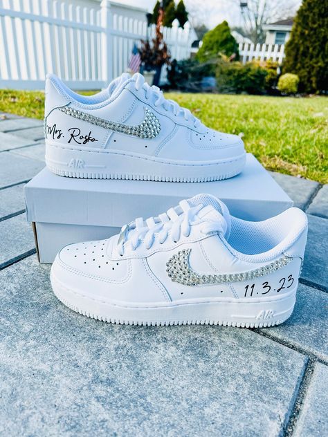 Blinged out bridal Air Force 1 sneakers personalized for the brides special day 👰🏻 **PLEASE READ LISTING CAREFULLY**  SNEAKERS: This listing if for Nike Air Force 1, if you would like something different please message me :) Personalization section please add: *your name  *date of wedding *if you want them without any customization please type (no customization) NOTE: A proof of your lettering will be sent to you within 72 hours of purchasing, please check your messages to approve image. If se Bride Nike Air Force, Bridal Air Force Ones, Bride Air Force Ones, Air Force 1 Wedding, Wedding Customization, Sneaker Wedding, Wedding Shoes Sneakers, Lace Outer, Wedding Glamour