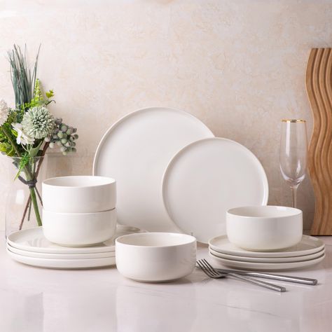 PRICES MAY VARY. 【 ELEGANT AND STYLISH DESIGN 】This dinnerware sets leads the dining trend with its expressive colors and finishes. With its vibrant color palette and captivating finishes, it creates an alluring ambiance that exudes warmth. The eye-catching reactive glazes and rich, vivid hues not only soothe the senses but also elevate your dining experience. The generously-sized plates provide ample space for displaying your delectable creations, while their deep bottoms prevent any sauce from Plates And Bowls Set Dinnerware, Plates And Bowls Set, Modern Dinnerware, Ceramic Dinnerware Set, Ceramic Dinnerware, Reactive Glaze, Ceramic Tableware, Handmade Bowl, Great Housewarming Gifts