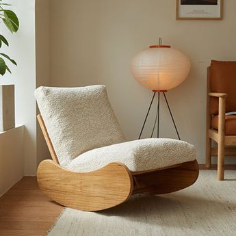 In the hustle and bustle of modern life, we all crave a serene corner to unwind and rejuvenate. This white oak rocking chair is the perfect choice for just that. Crafted from high-quality white oak, it exudes a subtle yet luxurious feel with its sturdy texture and natural grain. The soft white fleece cushions on the seat and back offer a contrasting touch, creating a comfortable seating experience. Imagine sitting in this rocking chair on a sunny afternoon, gently swaying with the breeze, embrac Aesthetic Rocking Chair, Product Design Chair, Aesthetic Furniture Living Rooms, Rocking Chair Modern, Modern Wood Chair Design, Rocking Chair Aesthetic, Floor Rocking Chair, Aesthetic Chairs, Accent Chairs For Bedroom