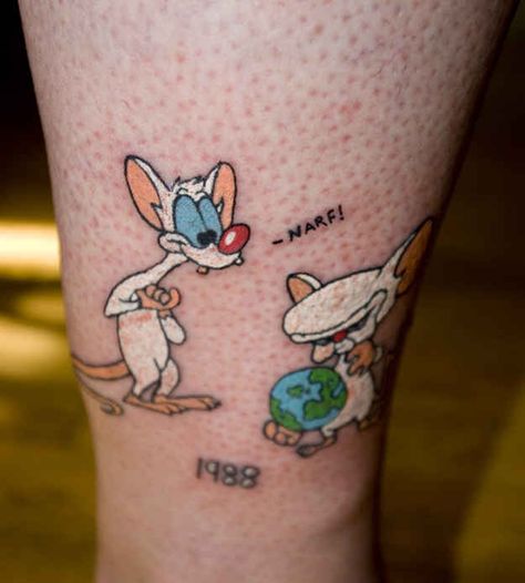 Does your tattoo plot to take over the world? | 21 Epically Nostalgic ’90s Cartoons As Tattoos Nostalgic 90s, Take Over The World, Inked Magazine, 90s Cartoons, Body Modification, Cartoon Tattoos, Creative Tattoos, The Brain, Brain