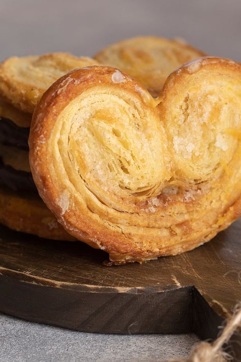 This is classic recipe for State Fair Elephant Ears yields, sweet, crispy pieces of pastry coated in a delicious cinnamon sugar for a sweet treat everyone will love. Elephant Ears are actually pretty easy to make at home with just 4 simple ingredients! Elephant Ears Cookies Recipe, Philo Dough Cookies, Easy Palmiers Recipe, Elephant Ear Cookies Puff Pastry, Puff Pastry Elephant Ears Recipe, Elephant Ear Recipe, Elephant Ear Pastry, Best Butter Tart Recipe, Elephant Ear Cookies