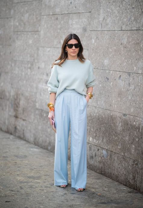 Set off powder blue top-to-bottom with colorful, chunky jewelry. Blue Light Pants Outfit, How To Style Light Blue Pants, Light Blue Work Pants Outfit, Light Blue Wide Leg Pants Outfit, Light Blue Slacks Outfit Women, Light Blue Pants Outfit Work, How To Style Blue Pants, Light Blue Outfit Casual, Blue Pants Work Outfit