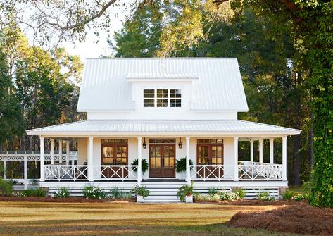 20 Porch Railing Design Ideas to Boost Your Home's Curb Appeal Small Front Porch Ideas With Railing, Houses Exterior Wrap Around Porch, Upper Deck Railing Ideas, Modern Farmhouse Railing Exterior, Craftsman Porch Railing Ideas, Fenced Front Porch, Painted Porch Railing Ideas, X Porch Railing, Houses With Big Porches