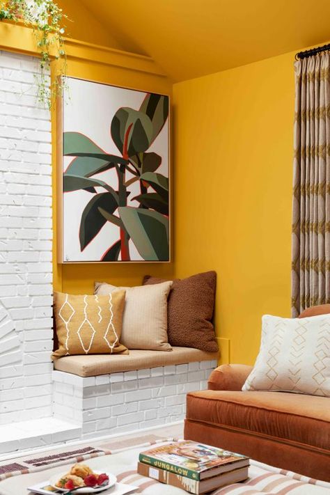 Golden Walls Living Room, Retro Yellow Living Room, Yellow Wall Decoration Ideas, Yellow Wall Decor Living Room, Mustard Wall Paint Bedroom, Yellow Paint Interior, Yellow Walls Decor, Marigold Living Room, Yellow Painted Walls Living Room