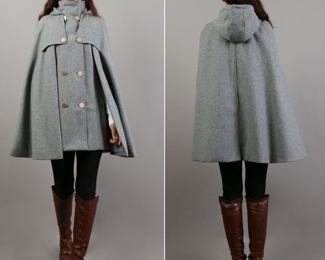 * A cool and long wool cape coat with hood, very elegant. * With double row gold color buttons and two pockets, fully lined. * If you want black or silver buttons, please let us know, thanks. * Stand up collar, more warmer. * Material: out shell - 50% wool, 50% polyester; lining - 100% polyester * Care: dry cleanable * Shop sizing chart FYI ( made according to US sizing. actual body figures, not laying flat clothes measurements) Size XS (US 2, UK 6, German 32, French 34, ) Bust: fits bust around Cool Winter Coats, Cloak Designs, German Clothes, Coat With Cape, Fantasy Coat, High Neck Coat, Mantel Cape, Wool Cloak, Poncho Fashion