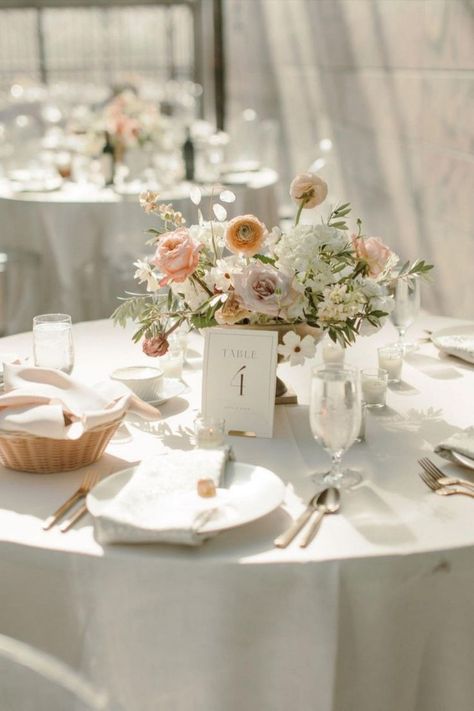 Romantic wedding tablescape featuring elegant table number cards & centerpieces in pastel hues | Midwest wedding, Omaha wedding planning, Nebraska wedding planner, luxury wedding planner, wedding inspo, wedding ideas, wedding reception decor, summer wedidng inspo, wedding tablescapes, wedding table decor, wedding table setting, wedding table centerpieces, wedidng menu, wedding stationery, wedding linens, modern romantic wedding, outdoor wedding, pink wedding theme, wedding details, dinner ideas Wedding Table Centerpieces Summer, Wedding Florals Round Table, Blush Pink Wedding Table Decor, Wedding Table Flowers And Candles, Summer Wedding Floral Centerpieces, Pastel Theme Wedding Decor, Wedding Table Circle, Wedding Table Decor Round Tables, Wedding Table Setting Ideas Elegant