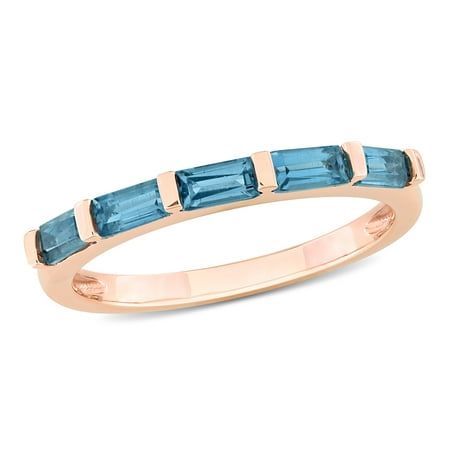 Discover the captivating allure of the Miabella Women's 1 CT TGW Blue Topaz - London Fashion Ring, meticulously designed in the enchanting embrace of 10k pink gold. This fashion-forward ring celebrates the mesmerizing beauty of the blue topaz-London gemstone, infusing each moment with a touch of elegance and sophistication. The gemstone's unique hue adds a captivating twist to the classic blue topaz, making this ring a truly distinctive piece. Its stackable design empowers you to effortlessly cr Heart Halo Ring, London Topaz, Mesmerizing Beauty, Gold Halo, Rose Gold Band, Emerald Engagement Ring, Fashion Ring, Rose Gold Jewelry, London Blue Topaz