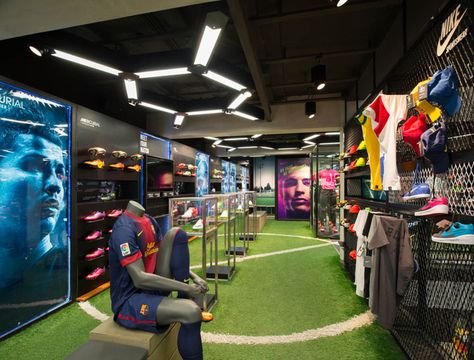 Ari Football flagship store Whitespace Bangkok 03 Football Store Display, Sport Bar Design, Sports Training Facility, Batting Cage, Soccer Store, Diy Living Room, Football Shop, Sports Field, Geometric Lighting