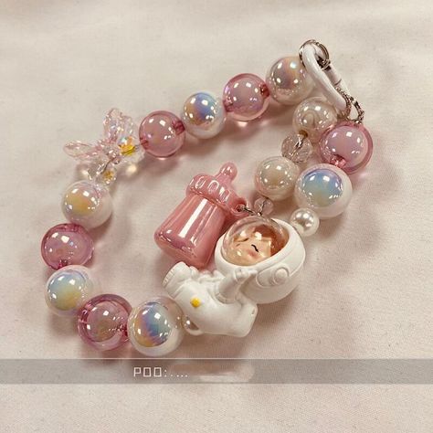 🔍 “Fun 3D doll astronaut beaded cartoon Korean phone charms” This charming bracelet features a fun 3D doll astronaut design with colorful beads. This Korean-style accessory doubles as a anti-lost keychain and phone charm, perfect for adding a touch of whimsy and functionality to your everyday outfits. Expertly crafted for durability and style. #nana #otaku #glitterresin #videogames #trending #phonestraps #beadsjewelry #handmadewithlove #fashion #phonechain #mobileaccessories #explorepage #b... Phone Charm Beads, Phone Beads, Korean Phone, Korean Phones, 3d Doll, Charming Bracelet, Manik Manik, Astronaut Design, Strap Phone