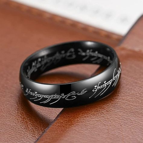 New! Hobbit Lord Of The Rings Black Elvish Rune Engraving Ring Details: - Condition: New - Color: Black - Material: Titanium Steel - Included: 1 X Ring Check Out My Other Listings! Other Items I Carry: Vintage Rings Retro Rings Men's Rings Sterling Silver Rings Engagement Bridal Wedding Rings Punk Biker Rings Ethnic Rings Floral Rings Pearl Rings Art Deco Rings Gothic Rings Couples Rings Ring Sets Heart Rings Funny Rings Silver Necklaces Gold Necklaces Vintage Necklaces And Earrings Handmade Jewelry Opal Rings Bracelets And Necklaces And Tons Of Popular Trendy Jewelry Deals. Lord Of The Rings Mens Wedding Ring, Goth Wedding Rings Men, Black Rings Men, Goth Wedding Ring, Colored Wedding Rings, Funny Rings, Silver Rings Engagement, Ethnic Rings, Mens Wedding Rings Black