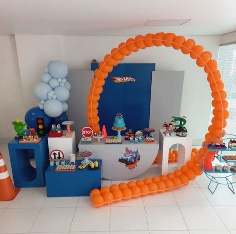 Hot Wheels Birthday Centerpieces, Hot Wheels Fourth Birthday, Hotwheels Centerpieces, Hot Wheels Table Decorations, Hot Wheels Birthday Party Food, Diy Hot Wheels Party Decorations, Hotwheels Birthday Party Decoration Boys, Hot Wheels 3rd Birthday Party Ideas, Hot Wheels 3rd Birthday