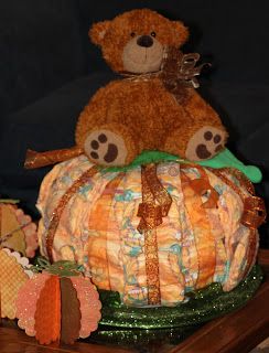 This coming Saturday is a baby shower for my daughter Vanessa.  The theme is "A little pumpkin is on the way!".  Her older sister, Beth, ask... Halloween Diaper Cake, Diy Diaper Cake Tutorial, Fall Diaper Cake, Pumpkin Diaper Cake, Dipper Cakes, Chelsea Baby, Fall Baby Shower Themes, Cake Pumpkin