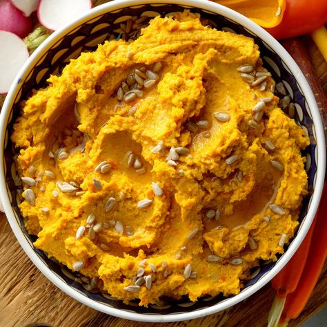 Spicy Roasted Carrot Hummus Roasted Carrot Hummus, Carrot Hummus, Roasted Carrot, Pumpkin Hummus, Hummus Recipe, Mashed Sweet Potatoes, Roasted Carrots, Taste Of Home, Dip Recipes