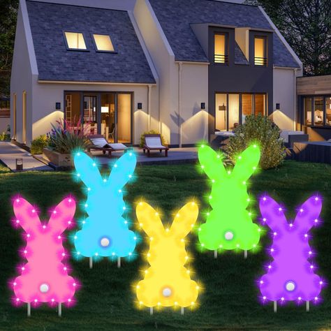 PRICES MAY VARY. 🐰【Unique Design】5 Pieces Easter bunny Yard Signs Outdoor Set of 5 Lawn Decorations with Light( Pink, Blue, Yellow, Green, Purple) 38cm Super-hard Stakes x 10 Tail (Pom Boms) x 5 Durable & Reusable Printed on Corrugated Plastic Weather Resistant and Waterproof Our bunny yard signs are designed with cute and vivid colors, which are perfect for decorating your yard, garden, patio, porch, or any other outdoor space during Easter. The unique shape and design of the signs will add a Lawn Decorations, Outdoor Set, Patio Party, Corrugated Plastic, Lawn Decor, Patio Porch, Outdoor Signs, Led String Lights, Yard Signs