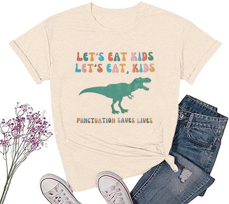 PRICES MAY VARY. Preschool Teacher Shirt: Cotton blend, soft, wrinkle free, breathable and stretchy fabric, comfy to your touch Funny Dinasour Shirt Ladies: This funny "Lets Eat Kids, punctuation saves lives" letter printed and dinasour graphic shirt is very cute and beautiful, lightweight, classic fit Dino T Rex Tee: Teacher shirts will be the best match with you, this women stretch top suitable for casual, daily wear, outdoor activities, vacation any other special occasion Kindergarten Teacher Teacher Tee Shirts, Kindergarten Teacher Gifts, Preschool Teacher Shirts, English Teacher Gifts, Silly Shirt, Dino Shirt, Kindergarten Gifts, Kindergarten Teacher Shirts, Teachers Gifts