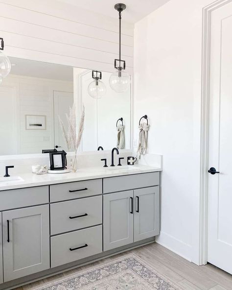 Modern Farmhouse Bathroom Designs in Grey and White - Soul & Lane Black Hardware Bathroom, Light Grey Bathrooms, Grey Bathroom Cabinets, Grey And White Bathroom, Gray And White Bathroom, Light Gray Cabinets, Farmhouse Bathroom Design, White Bathroom Cabinets, Grey Bathroom Vanity