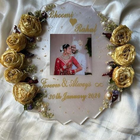 Wedding preservations 🤵💍👰💒 Get more :- https://www.artsaura.com/products/round-wedding-preservations Handmade Materials: Resin Size – 12 Inch Thickness – 15 MM Customize this Frame with your Roses, Photo, Date, and Couple Names. Preserve the memory of your special day with our Round Wedding Preservation kit. #artsaura #artwork #art #arts #indianart #homemade #homedecor #homedecoration #india #gujarat #artandcraft #creativity #creative #custommade #onlineshopping #onlinestore Rose Resin Art, Resin Photo Frame, Resin Art Photo Frame, Resin Wedding Photo Frame, Resin Art Photo Frame For Birthday, Resin Art Photo Frame For Couple, Resin Heart Photo Frame, Resin Flower Photo Frame, Indian Art