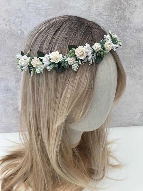 A beautiful rustic flower crown, created using white paper roses which are 1-2 cm wide and faux foliage, finished with satin ribbon. Ideal for your flower girls, bridesmaids or even the brides herself!  Perfect for weddings or occasions.  The size of the crown is 50 cm in length, if you require a smaller or larger crown, please pop me a message, please note that the flower crown is fully adjustable using the ribbon, and will fit toddlers to adults.  Custom orders are welcome. Can be made in a va Baby Shower Floral Crown, Flower Crown Quince, Flower Crown Simple, Bridesmaid Flower Crown, Wedding Flower Crowns, Flower Crown Flower Girl, Flower Crown Bridesmaid, White Flower Crown, Headband Crown