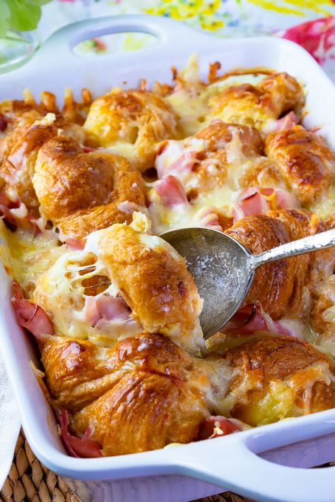 Buttery croissants, smokey ham, and gooey cheese are all baked together for the ultimate breakfast casserole. Inspired by the French classic, Croque Monsieur, this is an easy-to-make recipe that’s heavenly served with powdered sugar, jam and perfect for breakfast, brunch, and a must for the holidays. Breakfast Casserole With Croissants, Croissant Casserole, Croissant Breakfast Casserole, Ham And Cheese Croissant, Cheese Croissant, Best Breakfast Casserole, Overnight Breakfast, Croissant Breakfast, Ultimate Breakfast