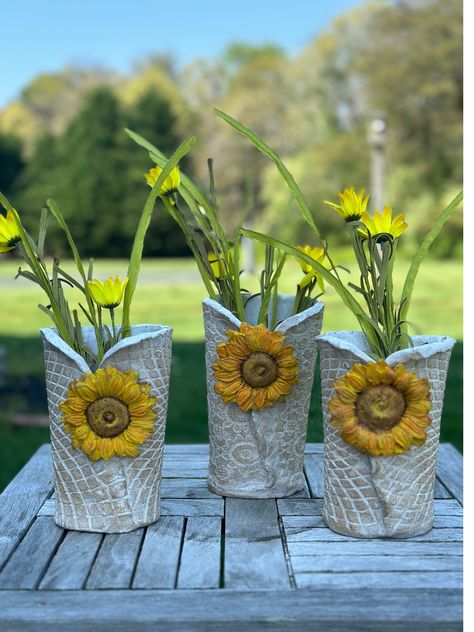 Textured Vase with a bright, cheery Sunflower, hand built, vases in speckled clay. We handcraft each piece in our studio here in Cape May County, NJ. Large Vase measures approximately 7.5" tall by 5" at the widest point. Small Vase measures approximately 7" tall by 4" at the widest point. Please note that all our products are meticulously handmade by artisans one piece at a time. Due to this process, there may be a minor variances in size, shape or color, from one item to the next. Such variatio Tall Vase Flower Arrangements Pottery, Ceramics Class Vase, Handmade Pottery Vases Blanket Creek Pottery, Flower Bricks Pottery, Unique Pottery Flower, Clay Vases Pottery Artful Home, Pottery Gifts Folksy, Handmade Gifts For The Garden, Pottery Just Art Pottery