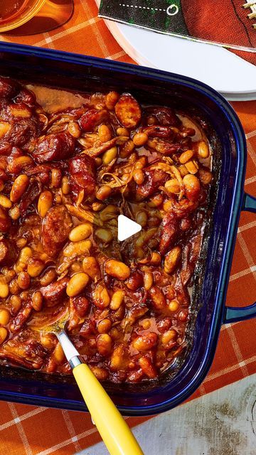 Southern Living on Instagram: "With pulled pork and smoky Conecuh sausage, this is a dish that won’t stay on the side of the tailgate table for long. Visit the link in our profile to see the full written recipe for Game Day Baked Beans! 🏈  Recipe: @spiceroots" Smoky Beans Recipe, Conecuh Sausage, Pork And Beans Recipe, Starchy Sides, Cheap Snack, Bbq Baked Beans, Tailgate Table, Pork N Beans, Sausage Links